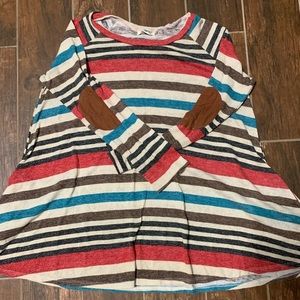 Striped tunic sweater with elbow patch.